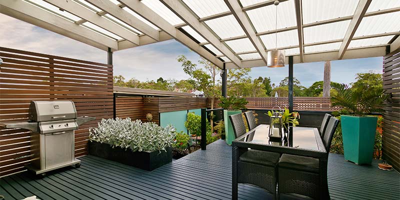 Outdoor timber deck patio with dining area